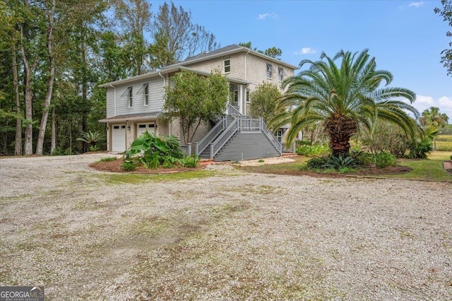 view of front of property featuring a garage