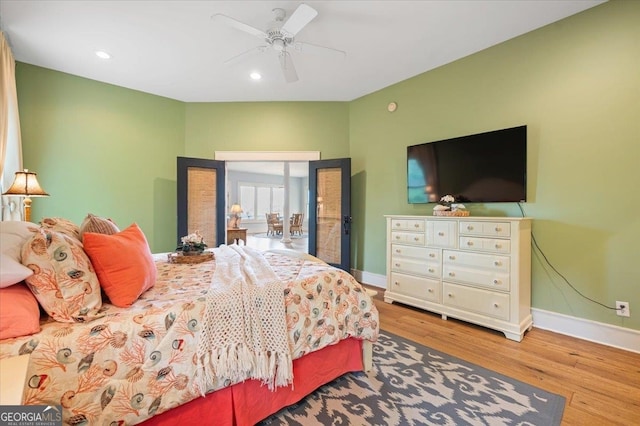 bedroom featuring ceiling fan and hardwood / wood-style flooring