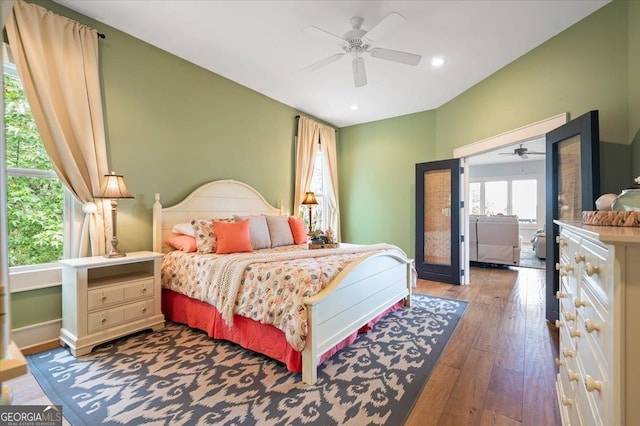 bedroom featuring ceiling fan and hardwood / wood-style flooring