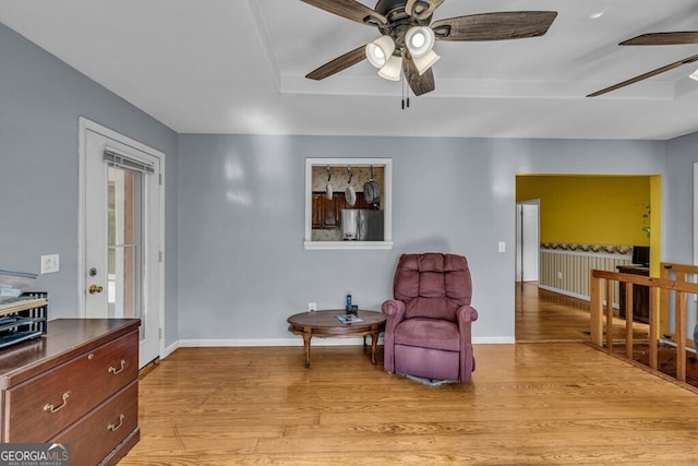 805 Quail Cove Cir, Warne, NC 28909 - sitting room featuring a ceiling fan, light wood finished floors, and baseboards