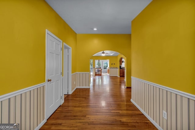 805 Quail Cove Cir, Warne, NC 28909 - corridor featuring arched walkways and wood finished floors