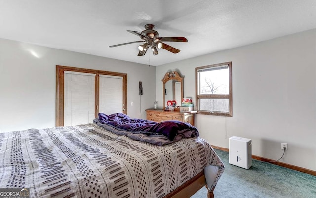 bedroom with dark carpet and ceiling fan