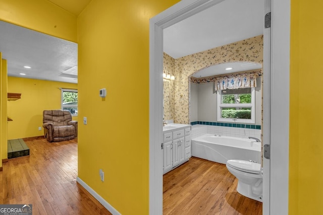 805 Quail Cove Cir, Warne, NC 28909 - full bath with wood finished floors, a garden tub, toilet, and vanity
