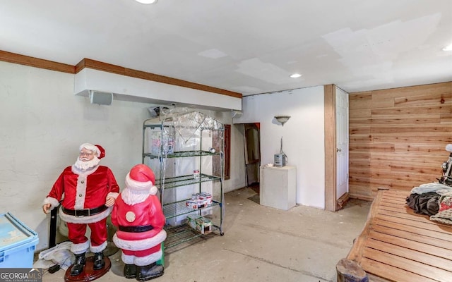 interior space featuring wood walls