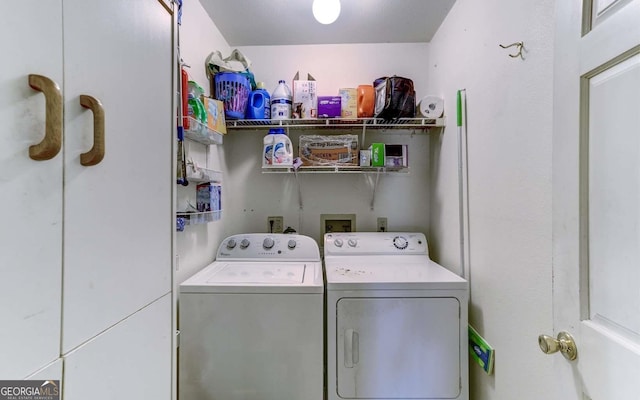 laundry area featuring hookup for a washing machine and washing machine and dryer