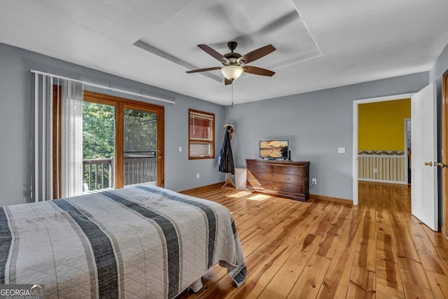 805 Quail Cove Cir, Warne, NC 28909 - bedroom with baseboards, access to exterior, light wood finished floors, and a ceiling fan
