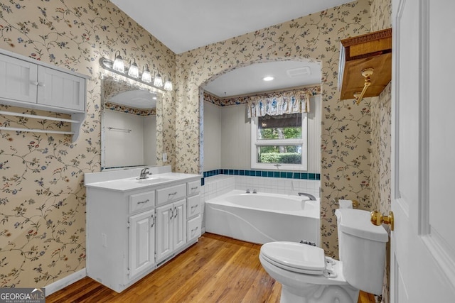 805 Quail Cove Cir, Warne, NC 28909 - bathroom featuring wallpapered walls, wood finished floors, a bath, vanity, and toilet