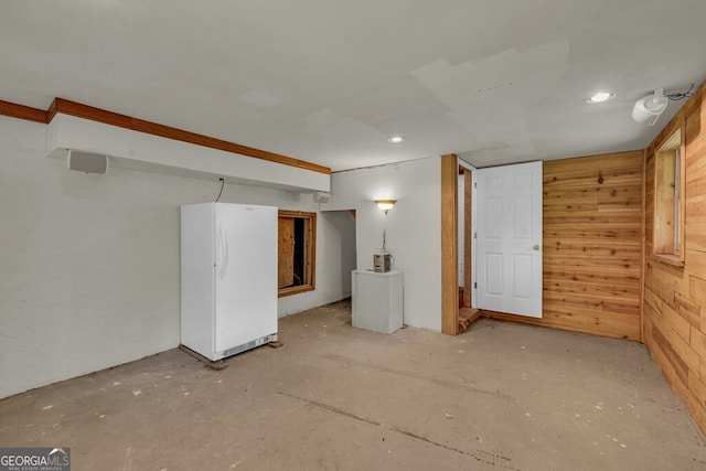 805 Quail Cove Cir, Warne, NC 28909 - finished basement featuring freestanding refrigerator, wood walls, and recessed lighting