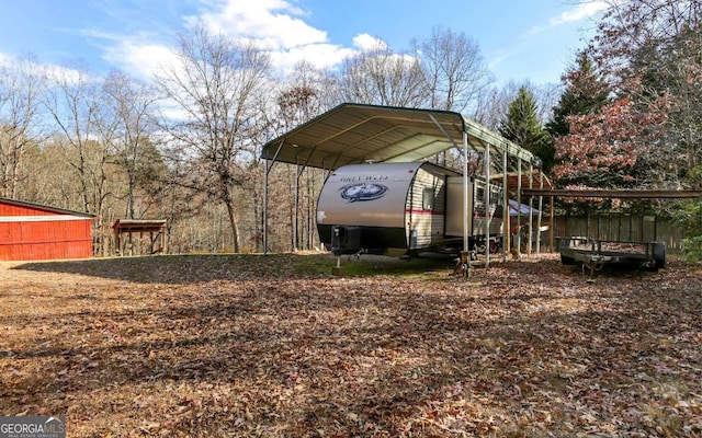 view of yard featuring a carport