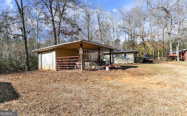 view of horse barn featuring an outdoor structure