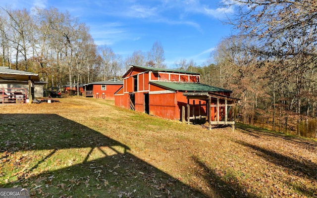 805 Quail Cove Cir, Warne, NC 28909 - back of house with a yard and an outdoor structure