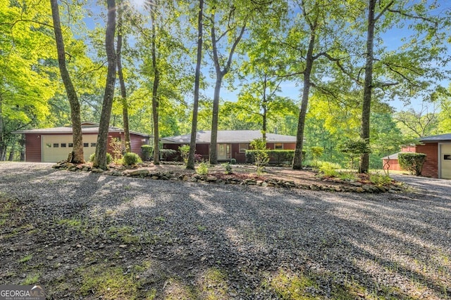 805 Quail Cove Cir, Warne, NC 28909 - mid-century home with a detached garage and an outbuilding