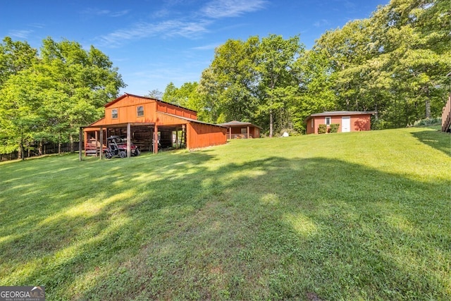 805 Quail Cove Cir, Warne, NC 28909 - view of green lawn with a pole building and an outdoor structure