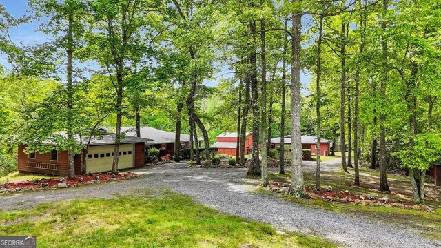 805 Quail Cove Cir, Warne, NC 28909 - view of front of house with a garage and driveway