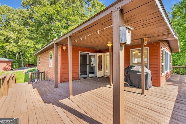 805 Quail Cove Cir, Warne, NC 28909 - wooden terrace with grilling area