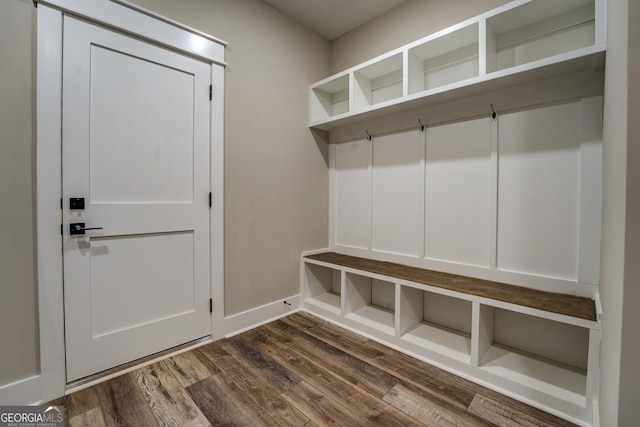 mudroom with dark hardwood / wood-style floors