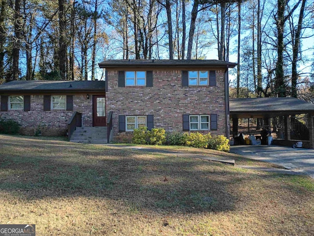 view of front facade featuring a front lawn and a carport