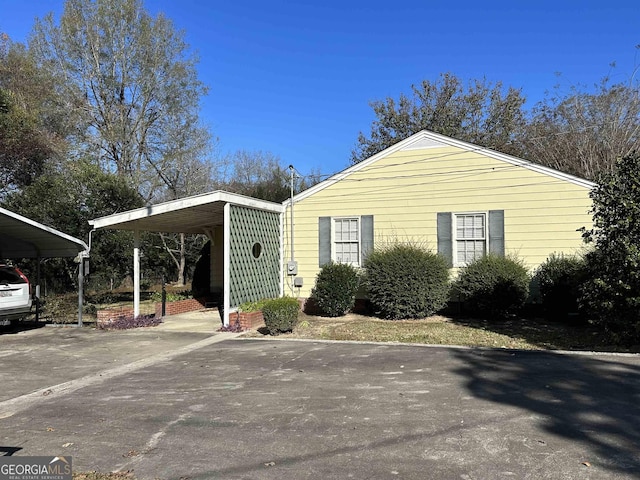 view of home's exterior with driveway