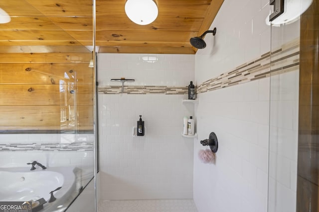 bathroom featuring wood ceiling, tile flooring, and a shower with shower door