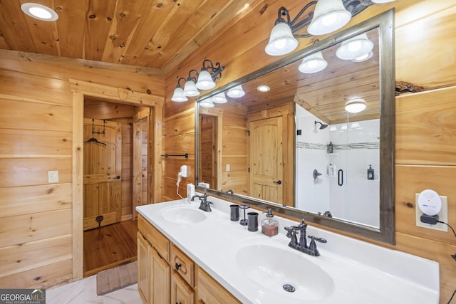 bathroom with oversized vanity, wooden ceiling, double sink, wooden walls, and wood-type flooring