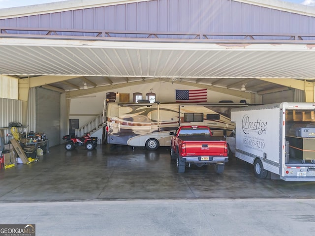 garage featuring a carport