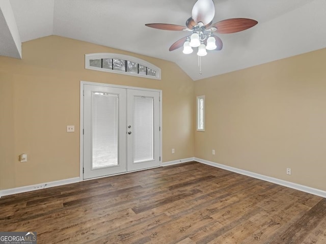 entrance foyer featuring french doors, plenty of natural light, dark hardwood / wood-style floors, and ceiling fan