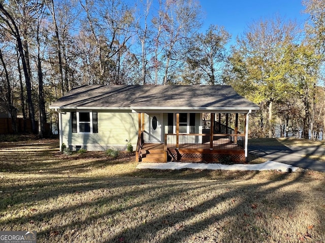 view of home's exterior with cooling unit and a yard