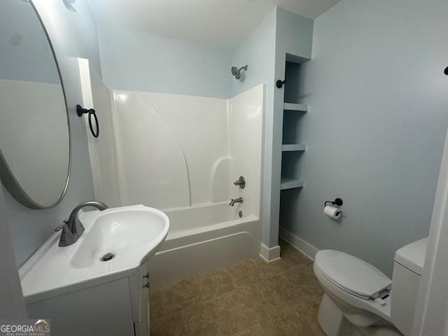 empty room with ceiling fan, dark hardwood / wood-style flooring, and lofted ceiling