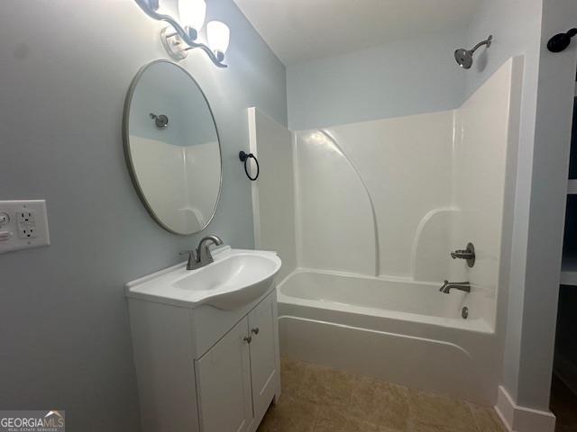 washroom with electric dryer hookup, water heater, and washer hookup