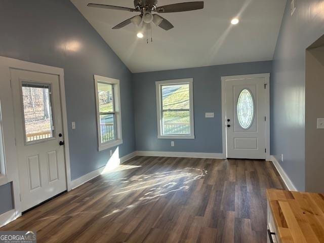 empty room with ceiling fan and dark wood-type flooring