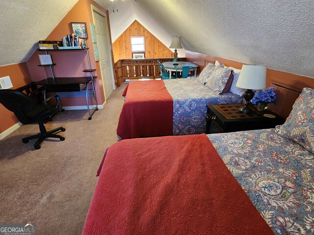 bedroom featuring carpet floors, a textured ceiling, lofted ceiling, and wood walls