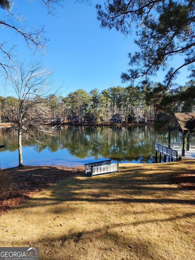 view of dock with a water view