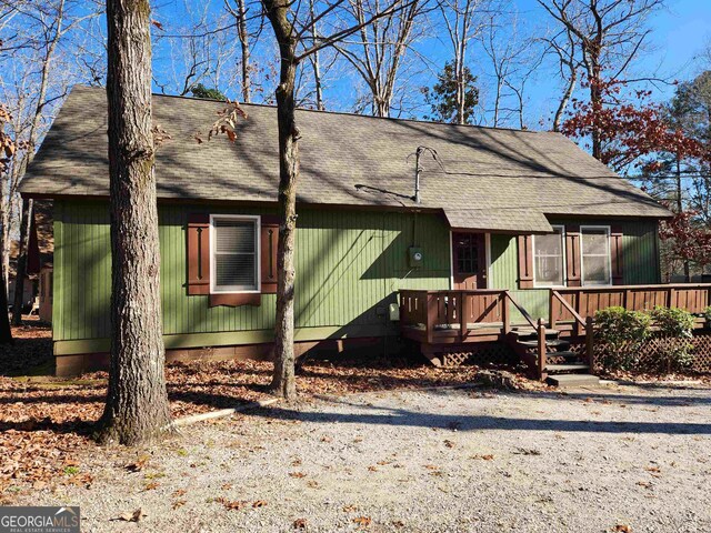 view of front of home with a deck