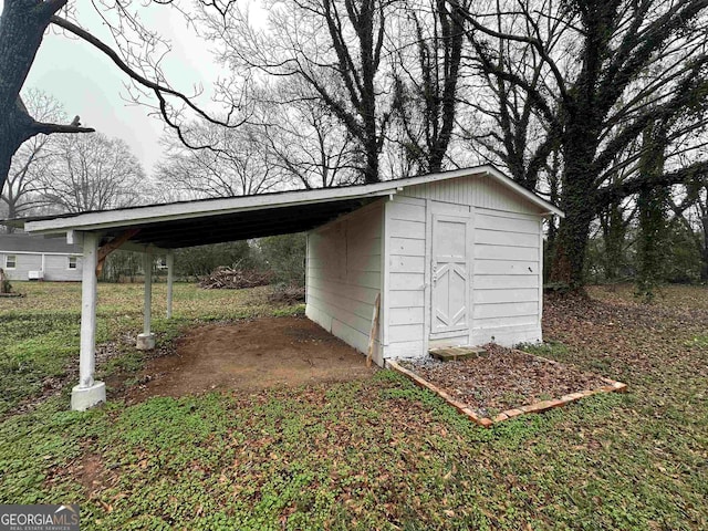 view of outdoor structure featuring a carport