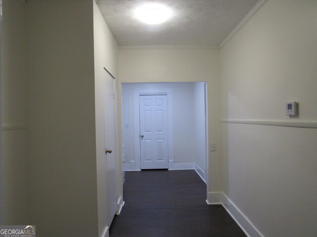4154 Houston Ave, Macon, GA 31206 - hallway featuring baseboards, ornamental molding, dark wood finished floors, and a textured ceiling