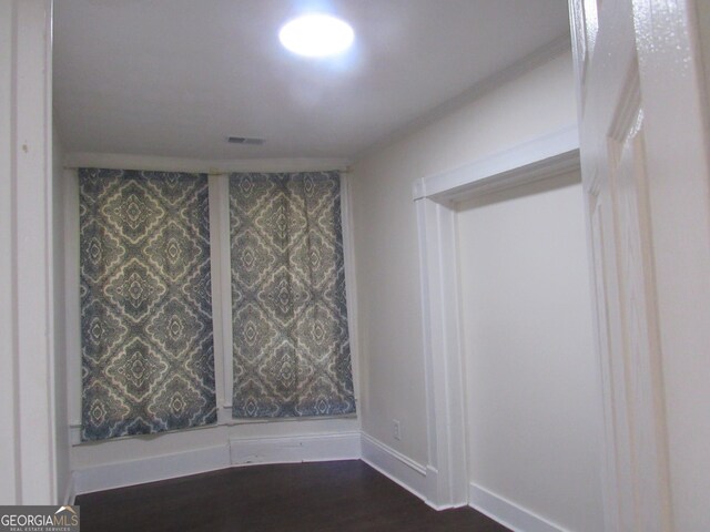 4154 Houston Ave, Macon, GA 31206 - empty room featuring baseboards and dark wood-style floors
