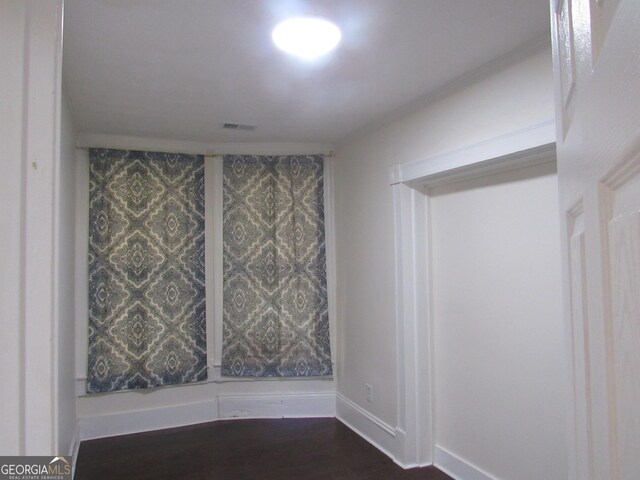 4154 Houston Ave, Macon, GA 31206 - empty room with baseboards and dark wood-type flooring