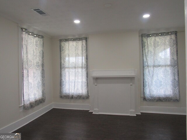 4154 Houston Ave, Macon, GA 31206 - spare room featuring baseboards, recessed lighting, visible vents, and dark wood-type flooring
