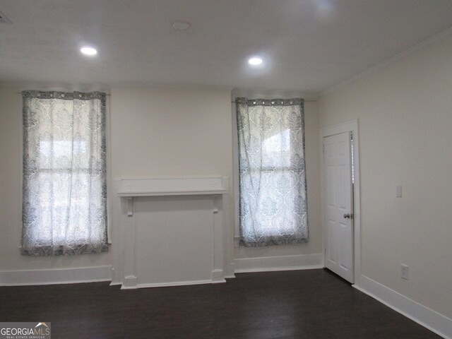 4154 Houston Ave, Macon, GA 31206 - interior space featuring recessed lighting, baseboards, visible vents, crown molding, and dark wood-style floors