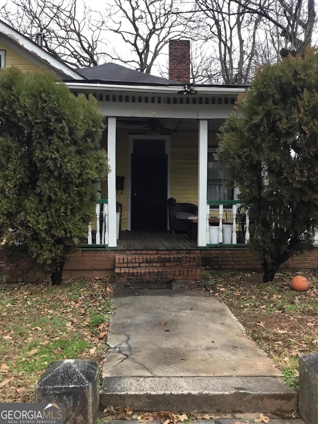 entrance to property with a porch