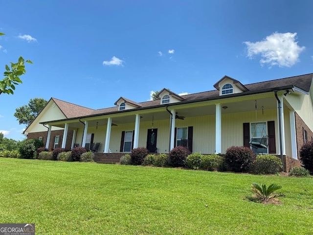 view of front of home featuring a porch and a front yard