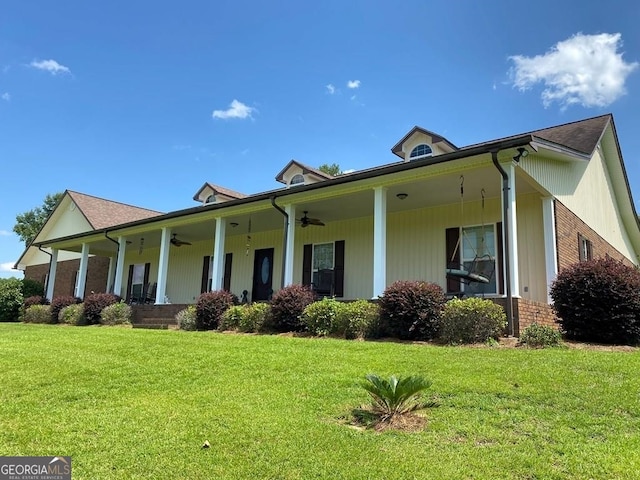 view of front of house with a front lawn and a porch