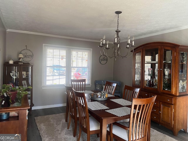 dining space featuring ornamental molding, a textured ceiling, a notable chandelier, and dark hardwood / wood-style flooring