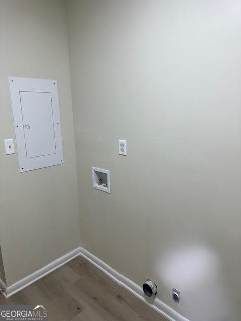 washroom featuring hardwood / wood-style flooring and hookup for a washing machine