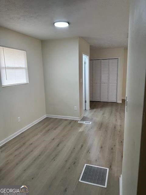 empty room featuring light hardwood / wood-style flooring