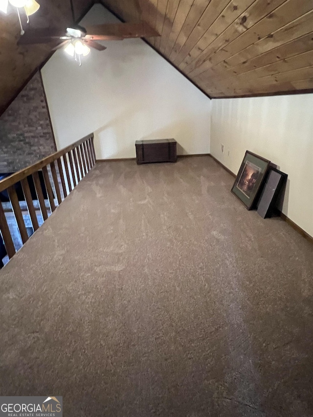 bonus room featuring vaulted ceiling, wooden ceiling, ceiling fan, and carpet