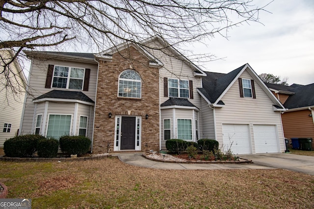 view of front of property with a garage