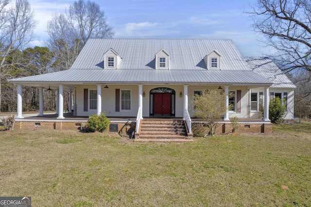 view of front of house featuring a front lawn and covered porch