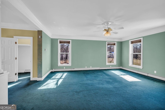 empty room featuring ornamental molding, ceiling fan, dark colored carpet, and a baseboard heating unit