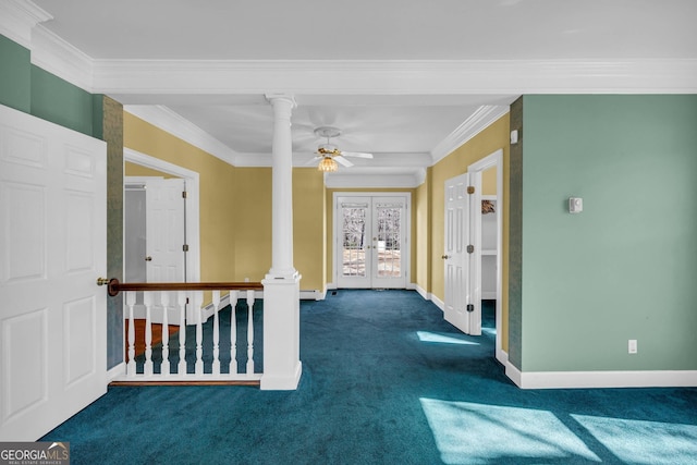 interior space with crown molding, french doors, decorative columns, and dark colored carpet